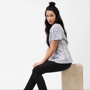 Jaanuu snake skin scrub top with gold zipper on side